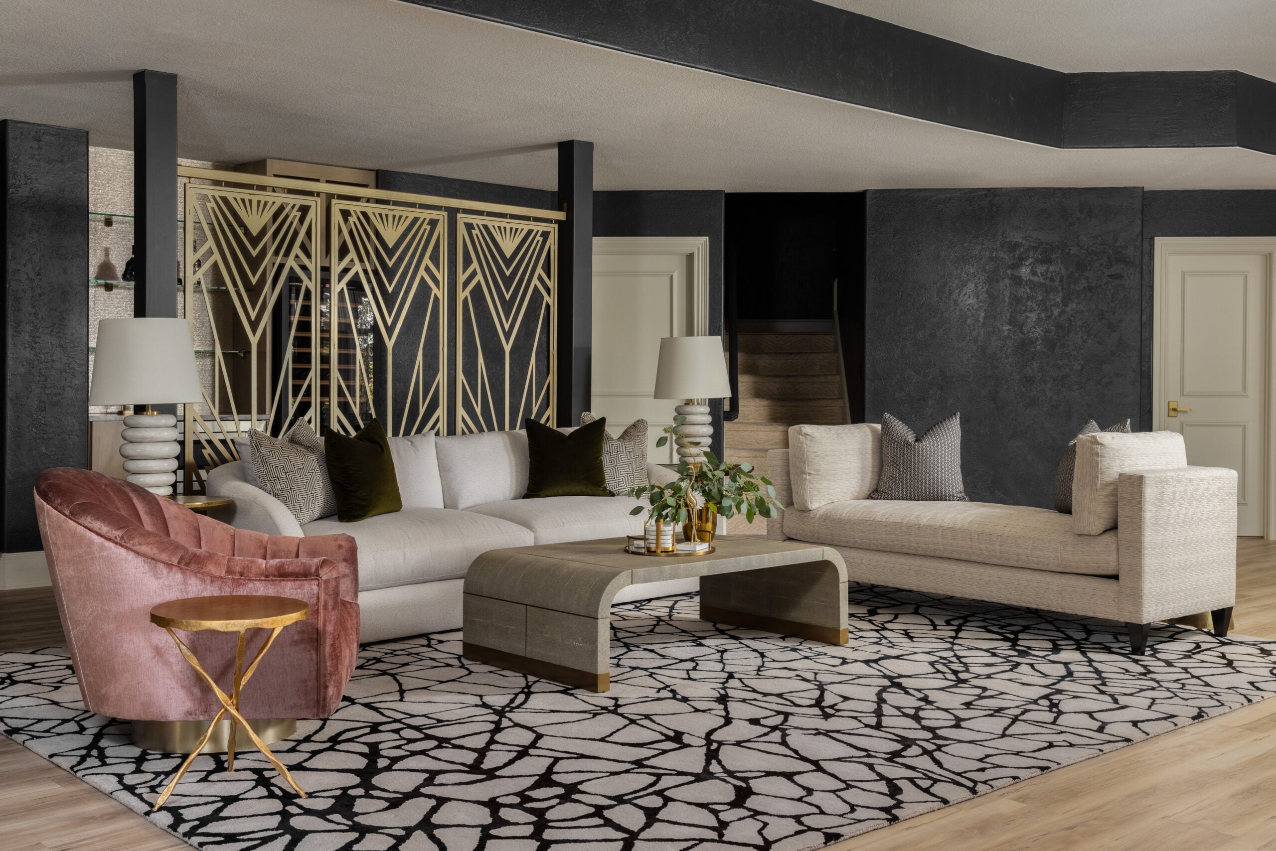 Open-plan living space painted in Benjamin Moore White Dove with Tricorn Black contrast.